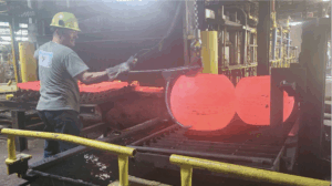 Forged hot ball valve component handled at Canton Drop Forge.